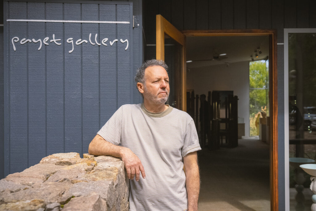 man out the front of gallery