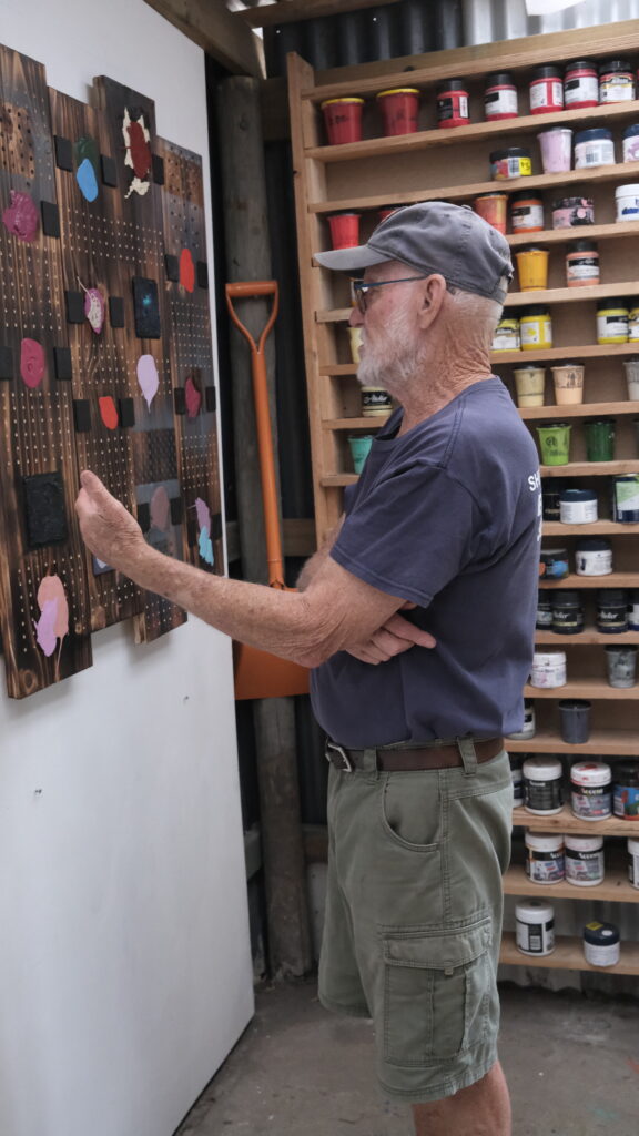 Man standing on the side speaking