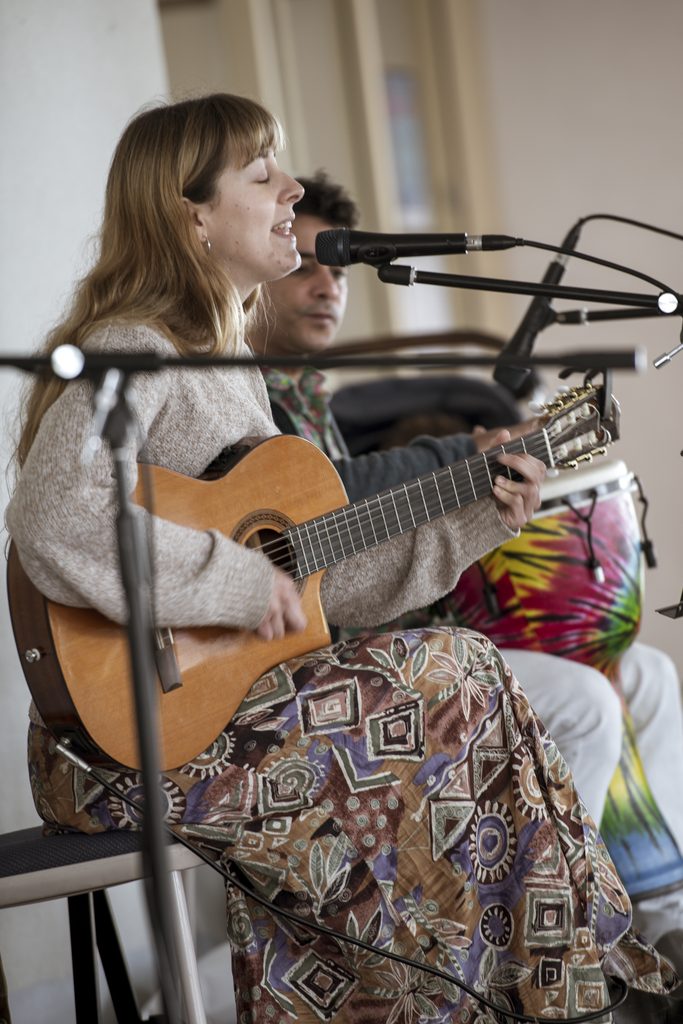 Guitarist performs at festival, Social Fabric's Multicultural Band.