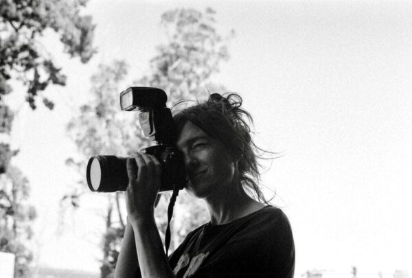 Image: Leith Alexander behind the lens. Photo by Margaret-Ellen Burns.